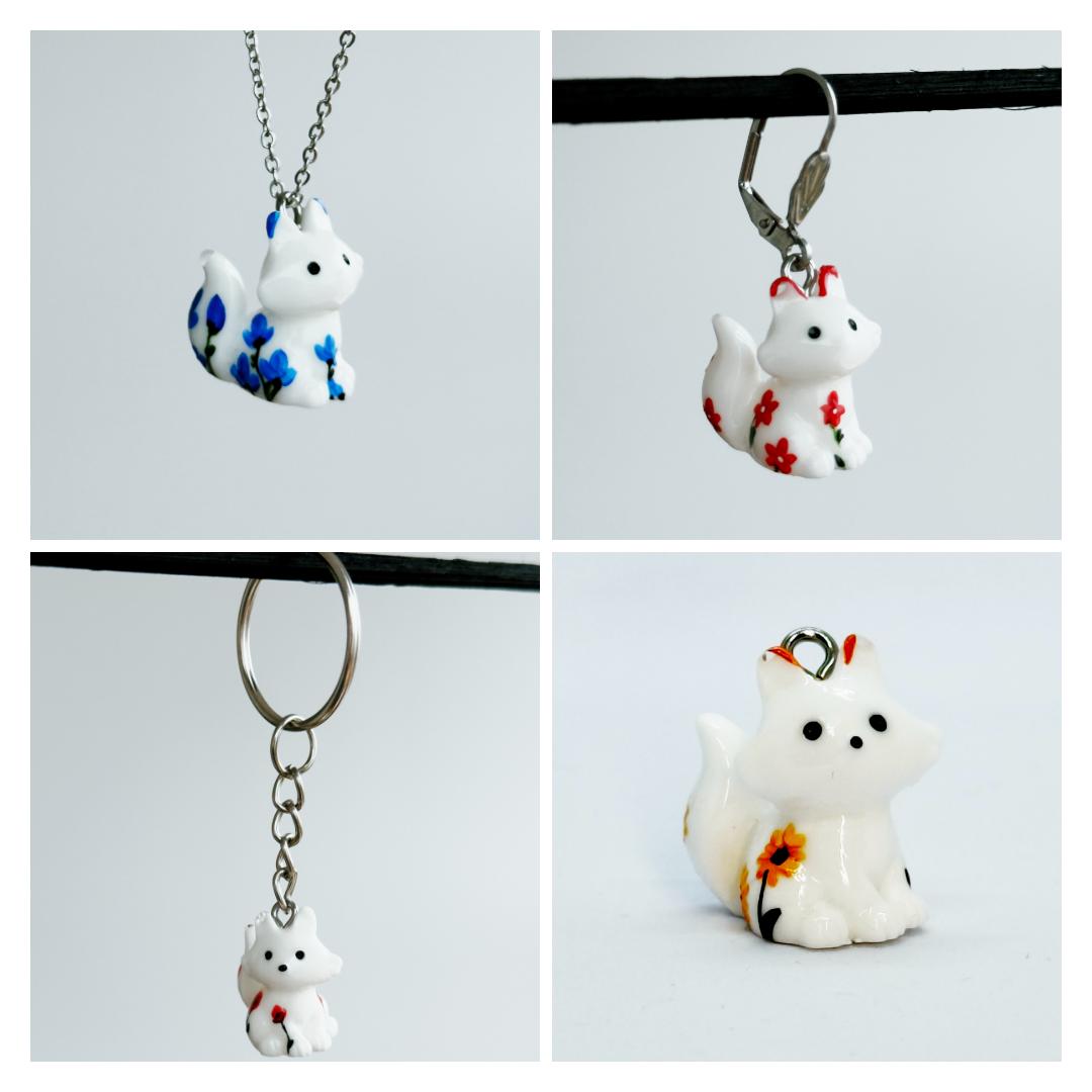 All pendants feature a miniature fox animal and hand-painted details.