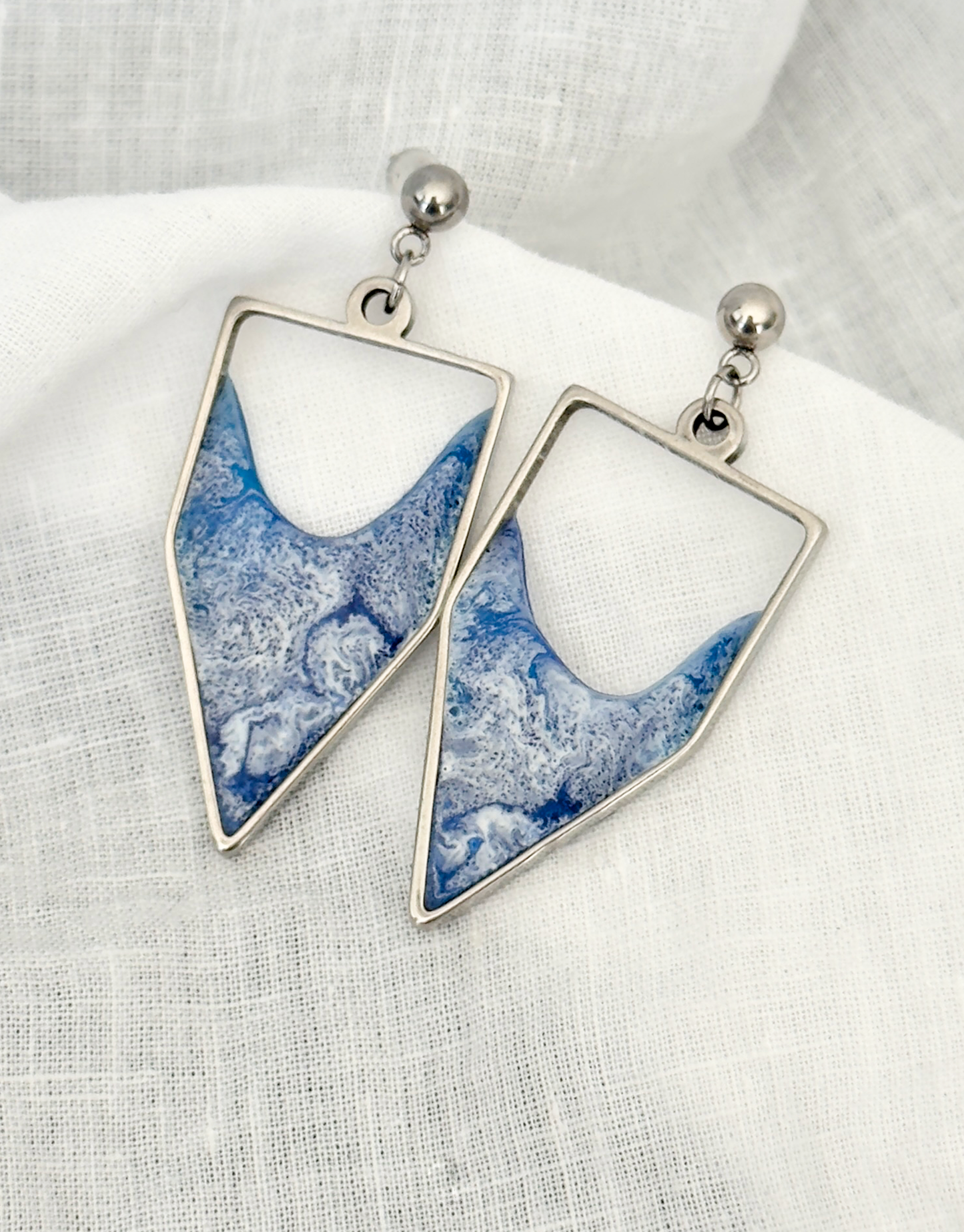 Stainless steel dangle earrings with waves