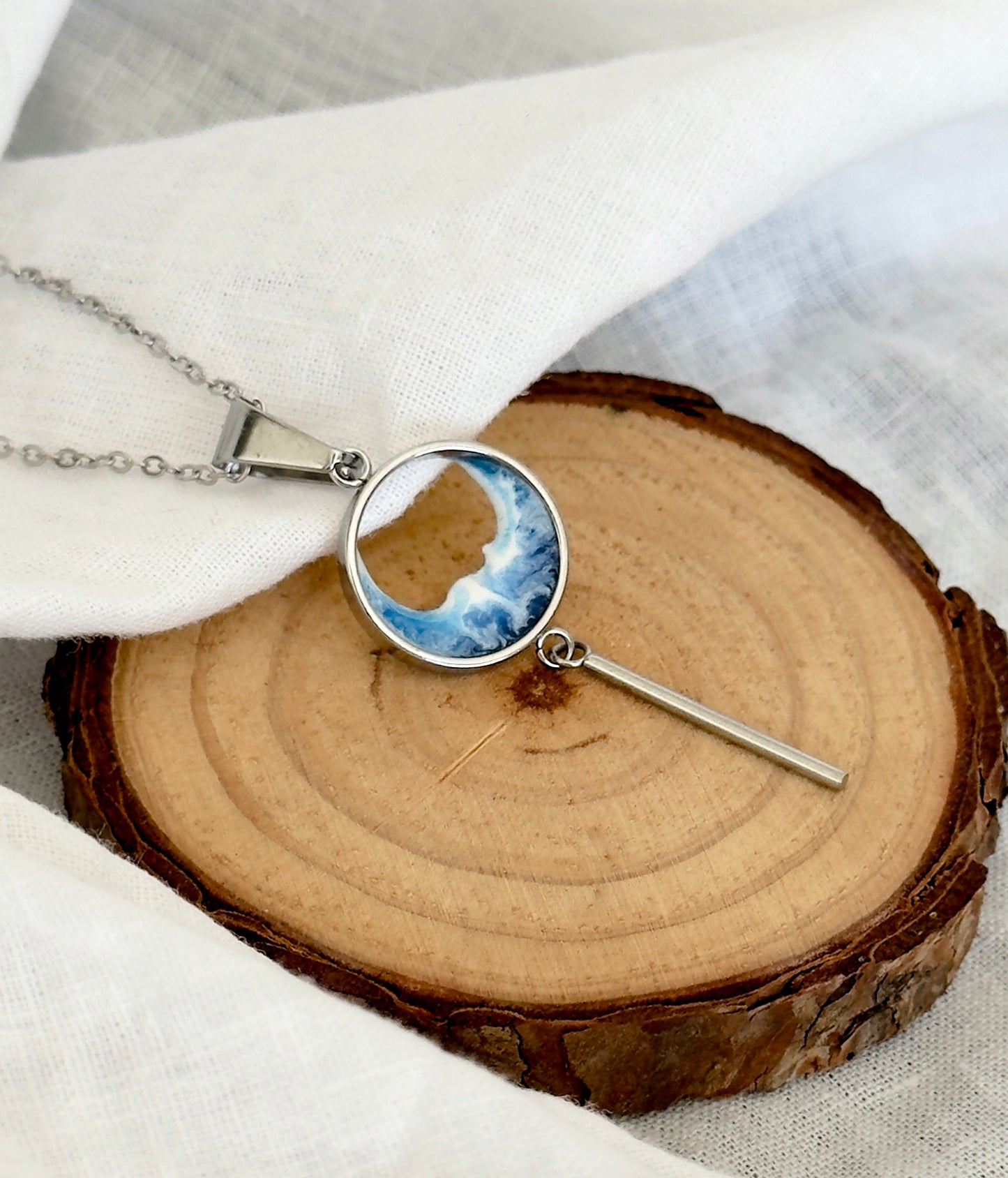 Colgante de acero inoxidable con olas