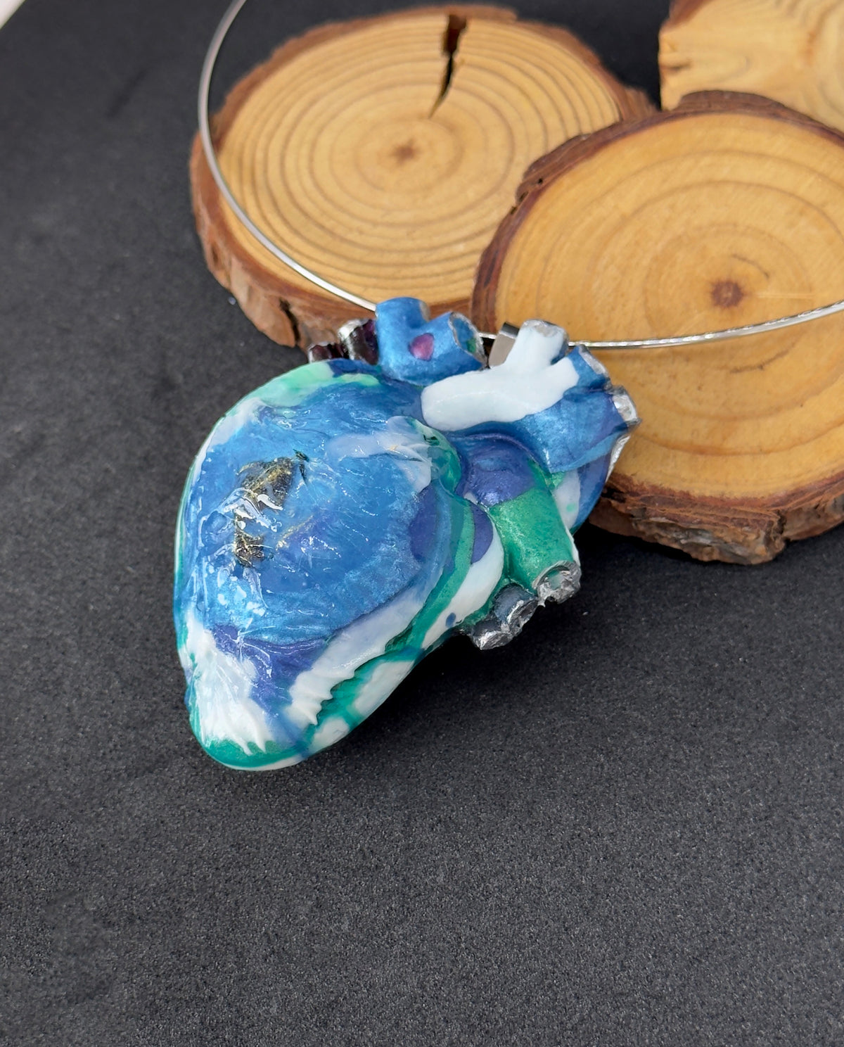 Large anatomical heart-shaped pendant, solid blue pendant