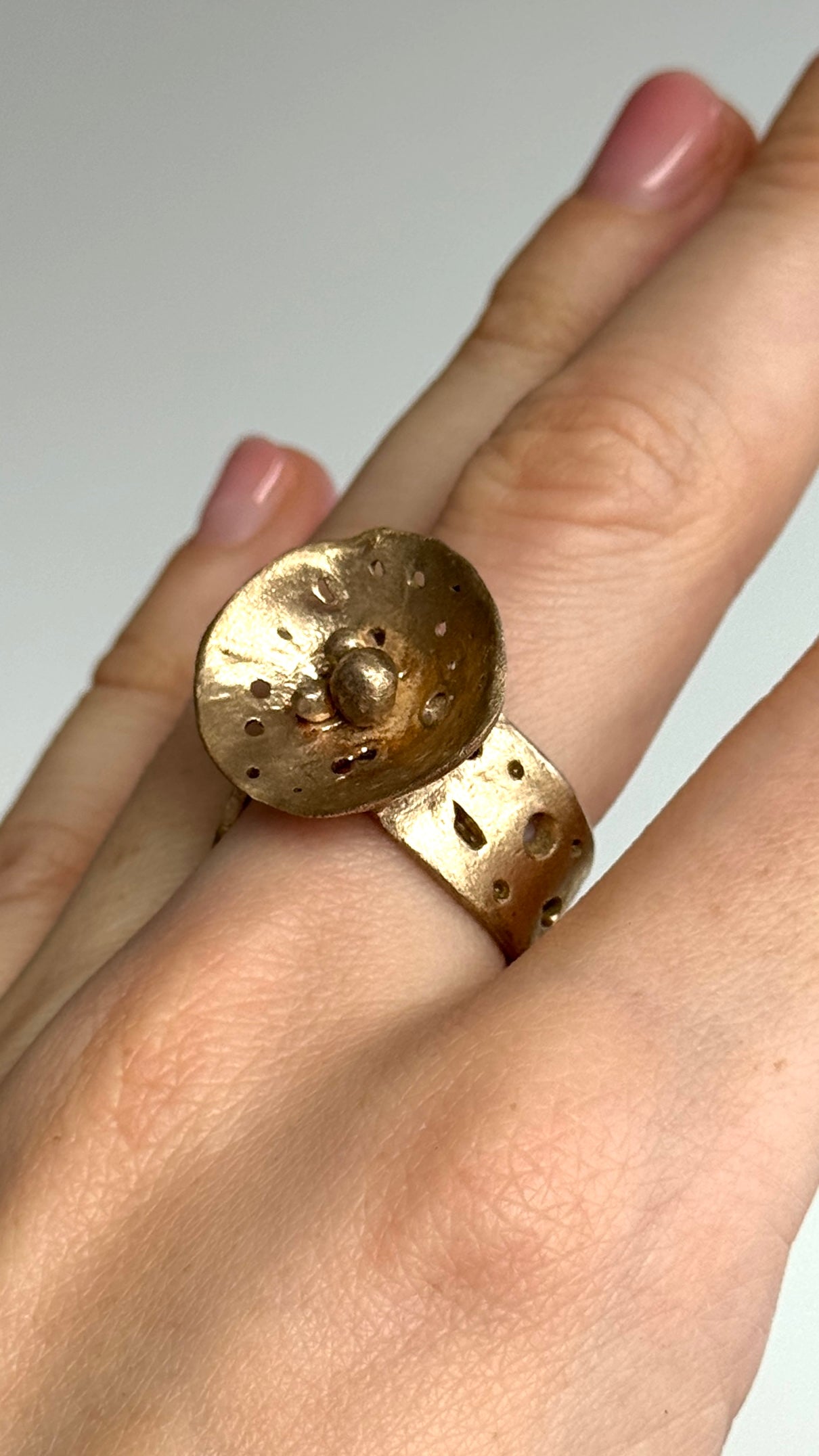 Adjustable size bronze ring