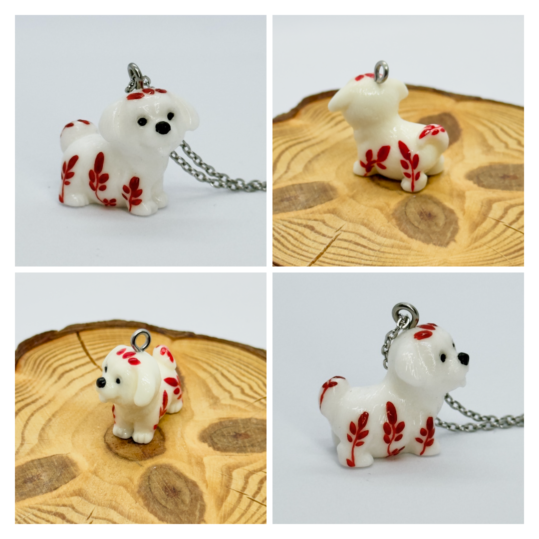 All pendants feature a miniature dog and hand-painted details.