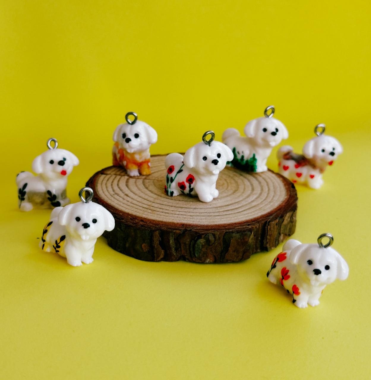 All pendants feature a miniature dog and hand-painted details.