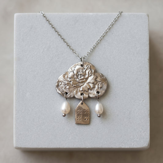 Colgante de bronce blanco «Reflexiones sobre el hogar»