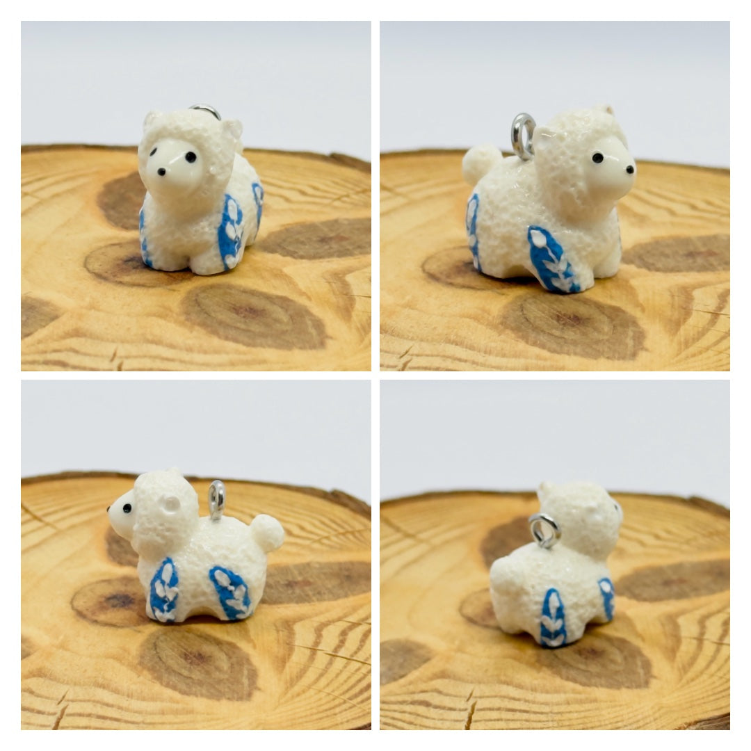 All pendants feature a miniature sheep animal and are hand-painted.