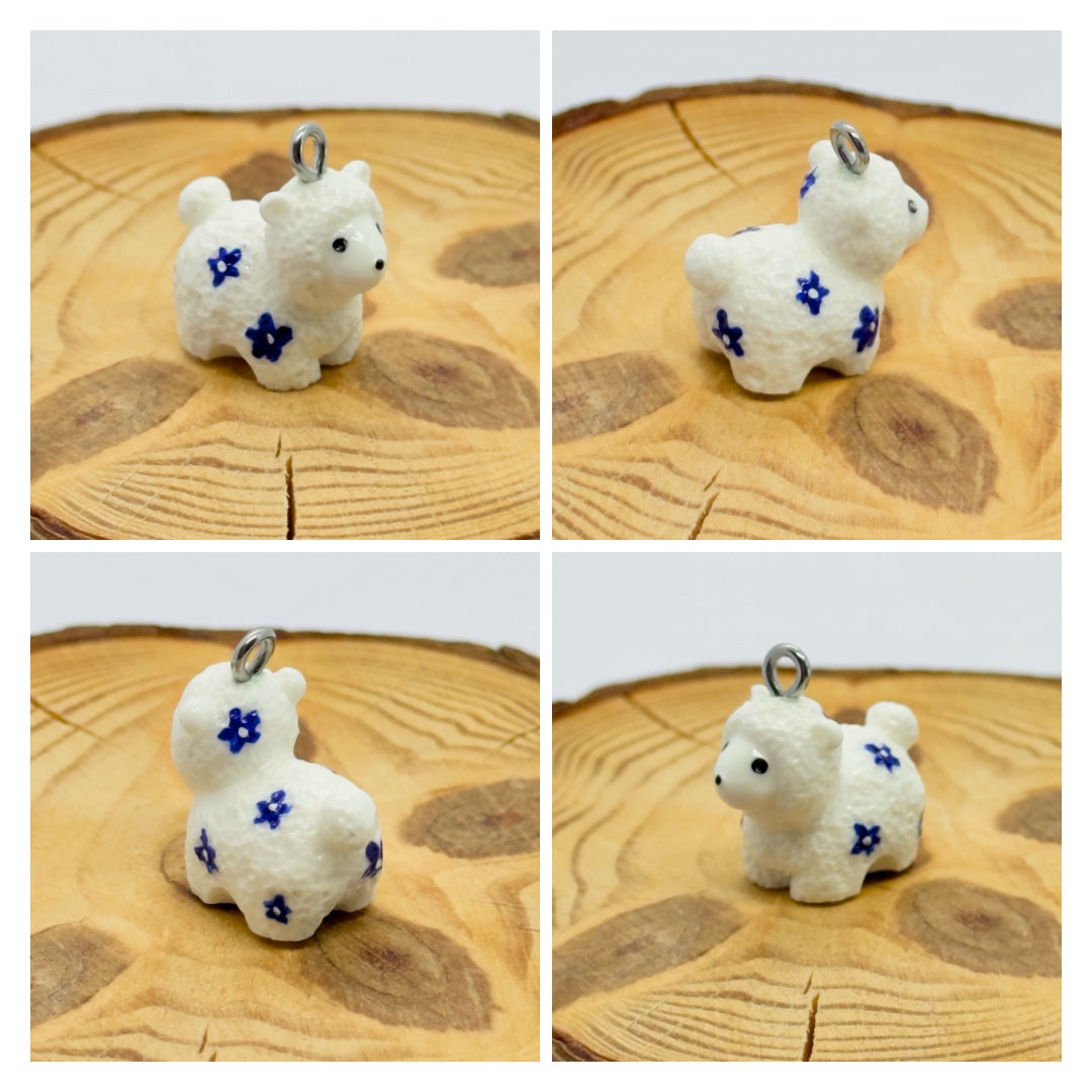 All pendants feature a miniature sheep animal and are hand-painted.