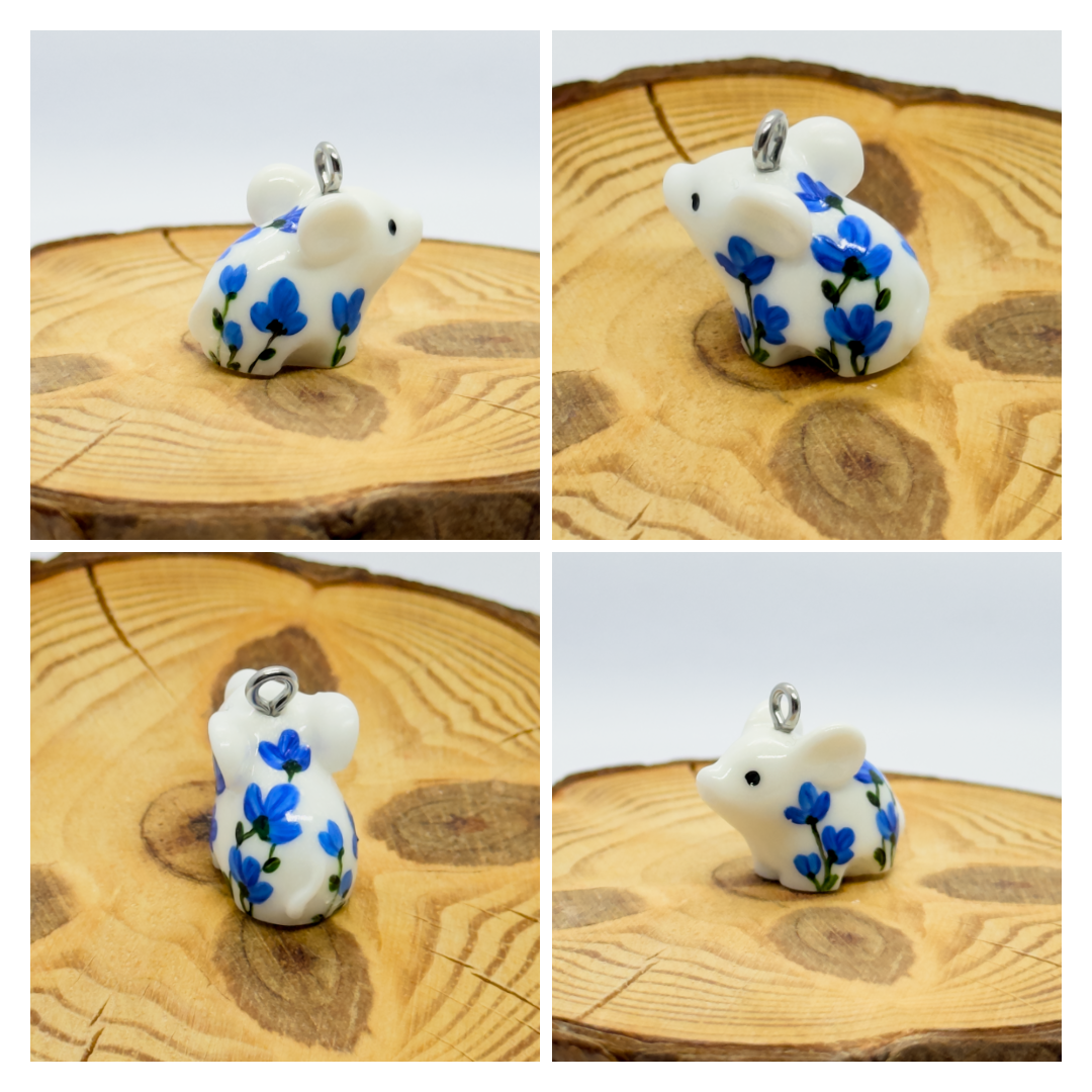 All the pendants feature a miniature piglet animal and are hand-painted.