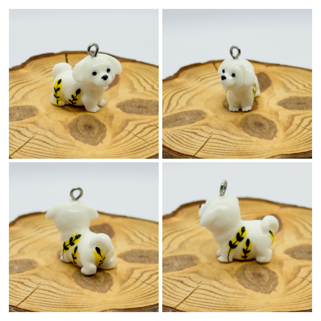 All pendants feature a miniature dog and hand-painted details.