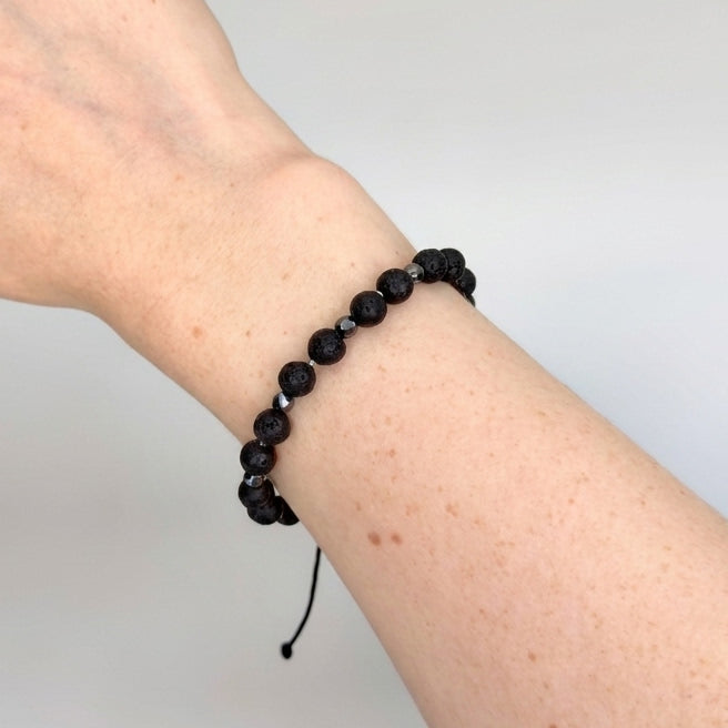 Unisex macrame bracelet with hematite and lava stone