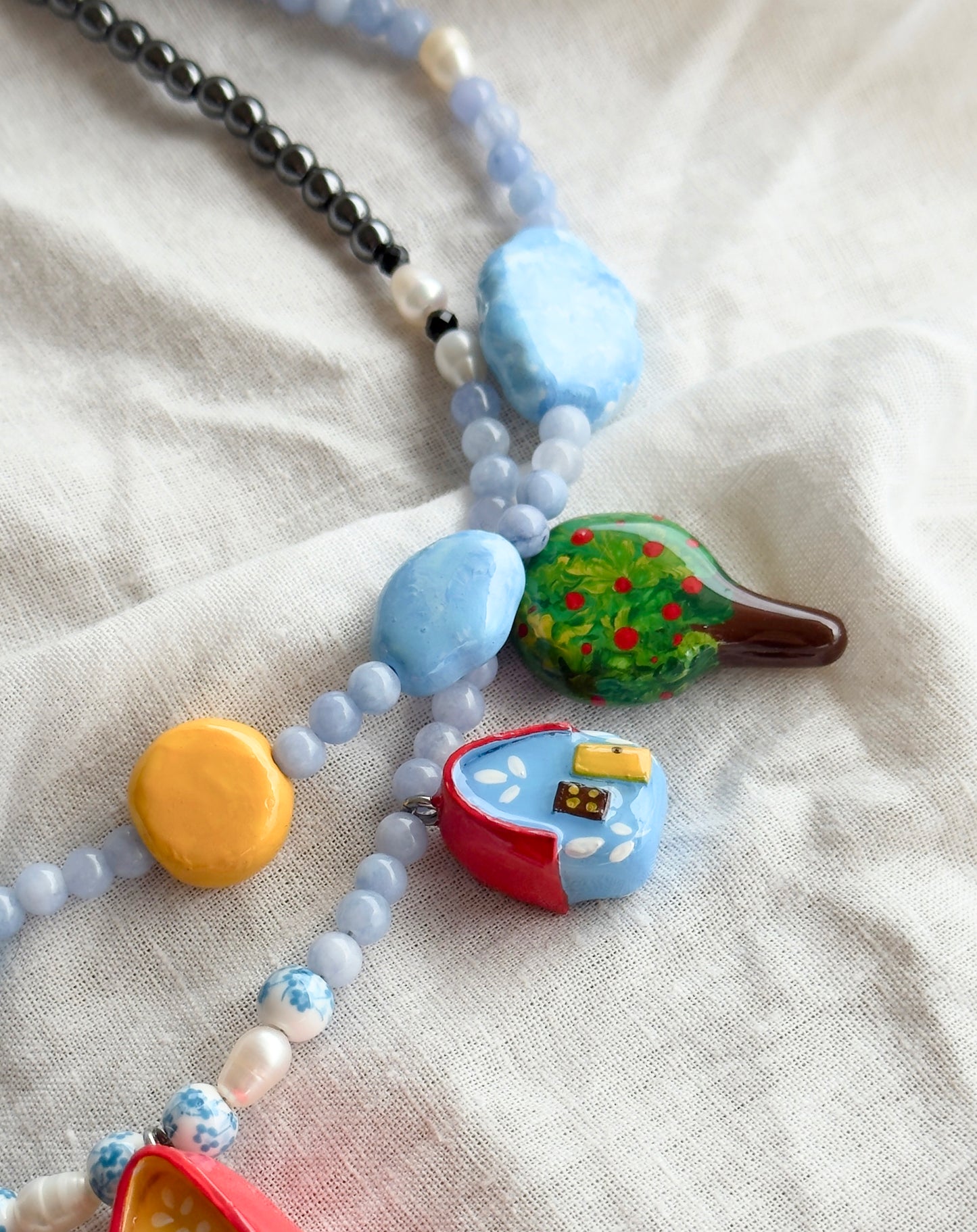 "Home" Necklace. Necklace with little houses and natural stones