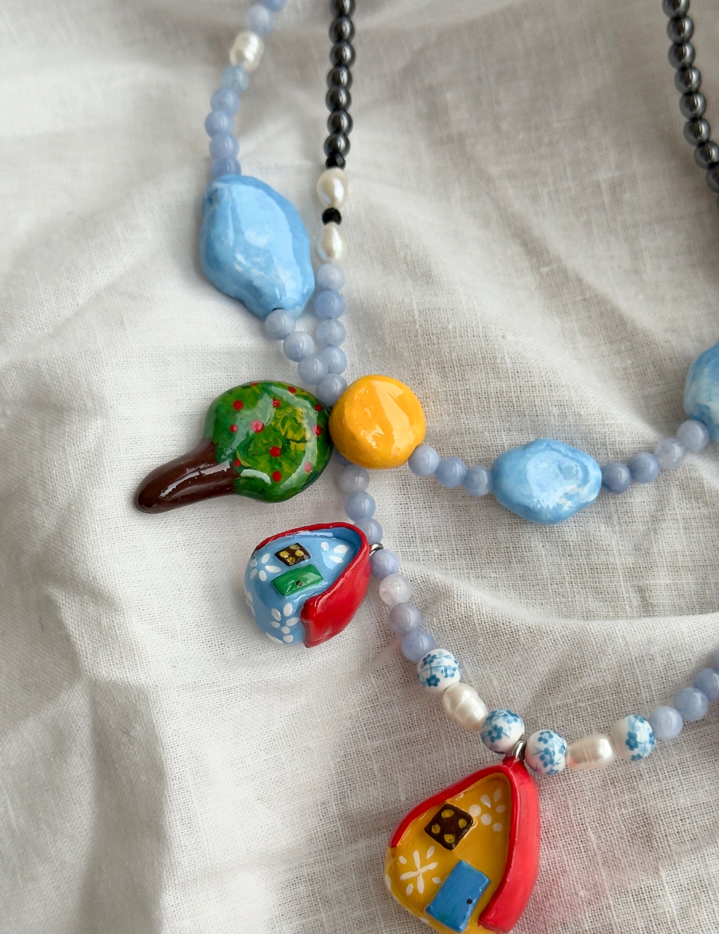 "Home" Necklace. Necklace with little houses and natural stones