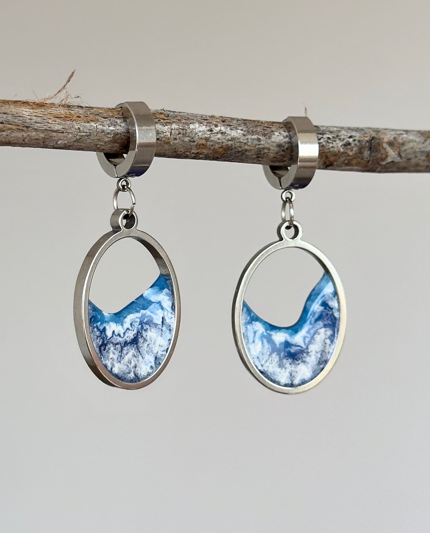 Stainless steel dangle earrings with waves