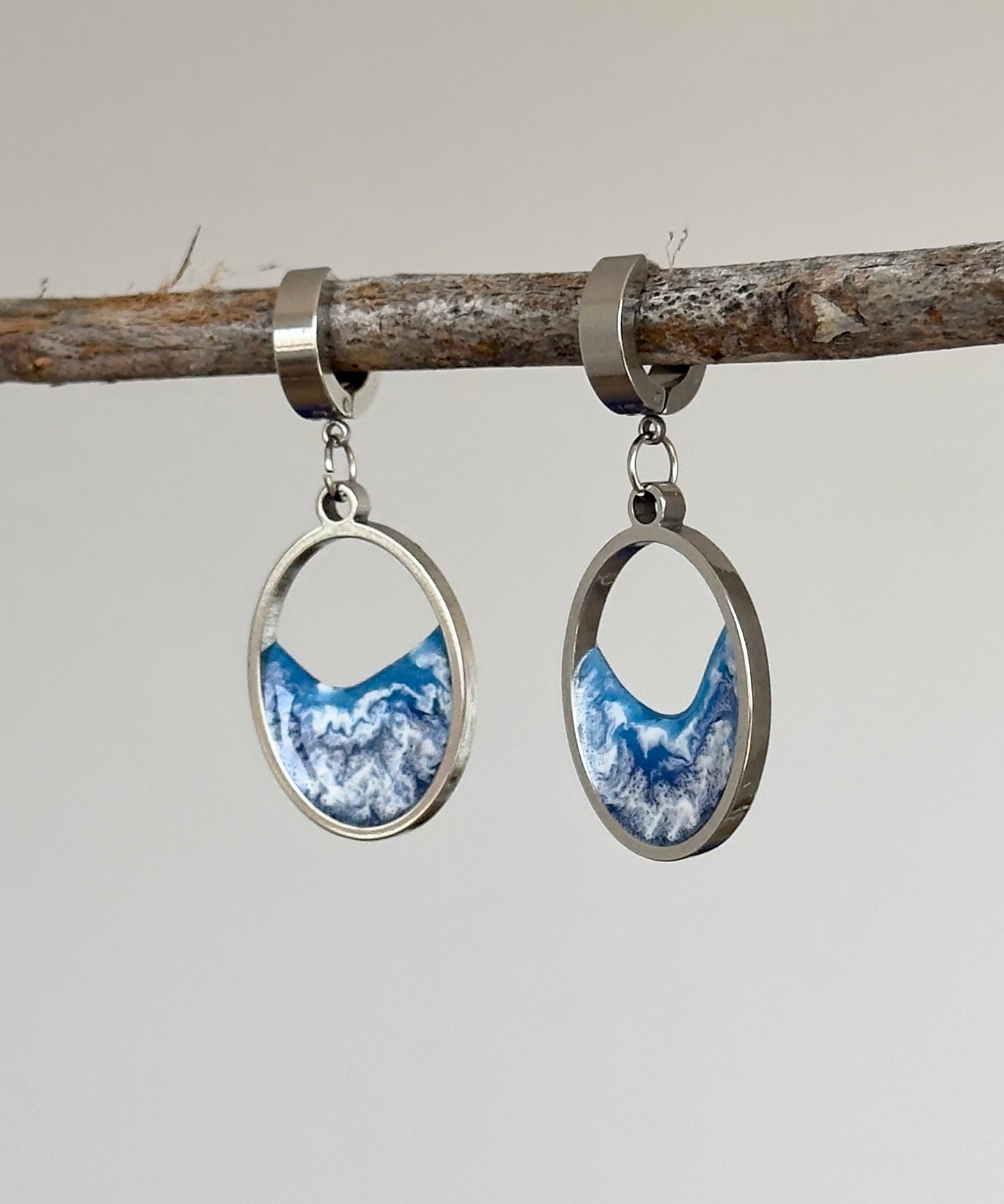 Stainless steel dangle earrings with waves