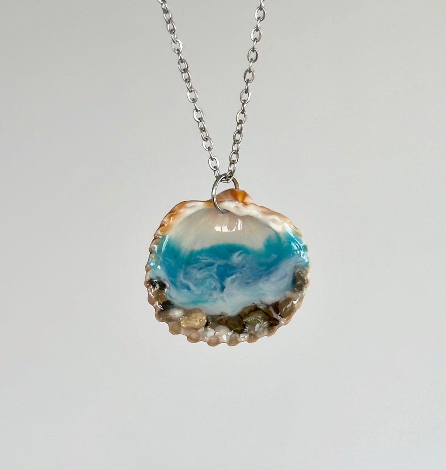Colgante concha con motivos marinos