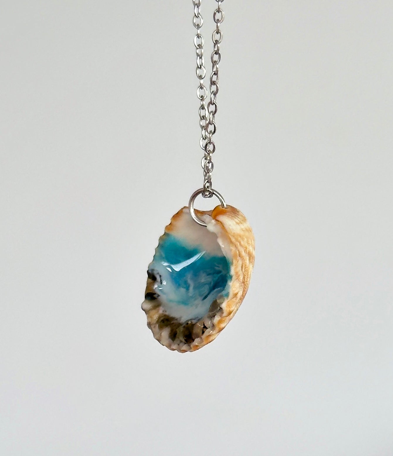 Colgante concha con motivos marinos