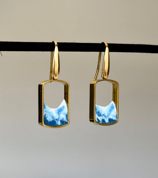 Stainless steel dangle earrings with waves