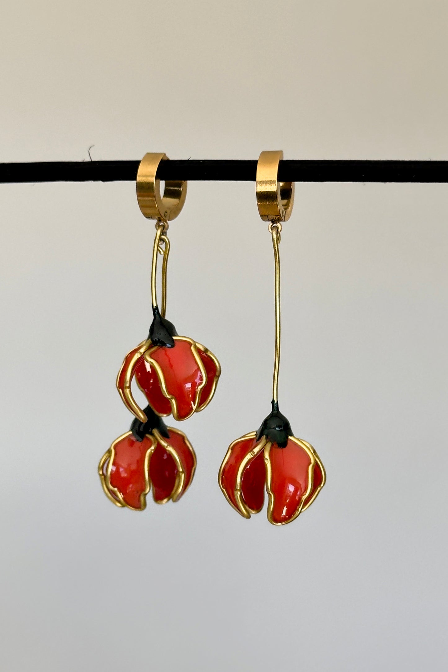 Pendientes con flores naranjas
