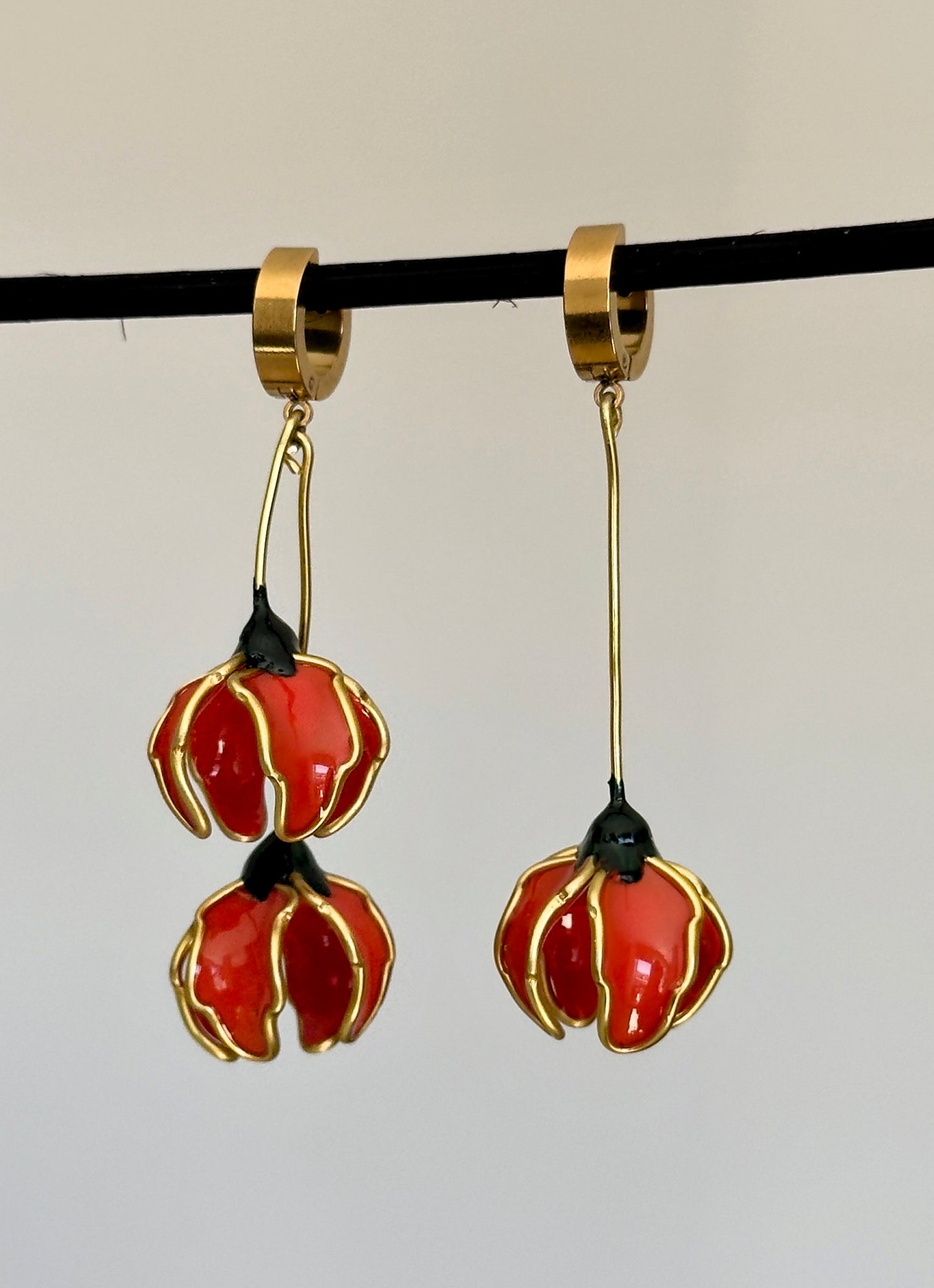 Pendientes con flores naranjas