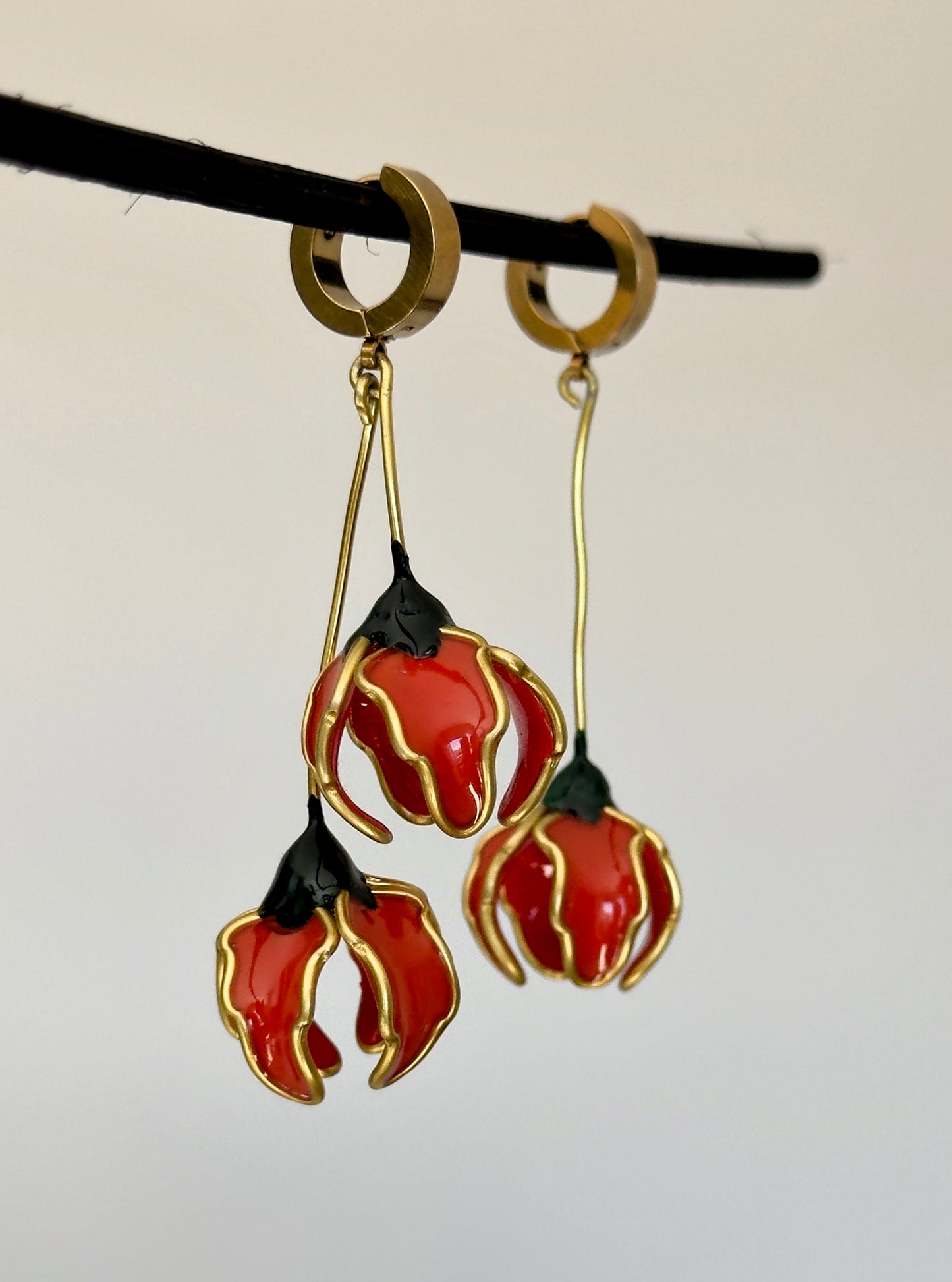 Pendientes con flores naranjas