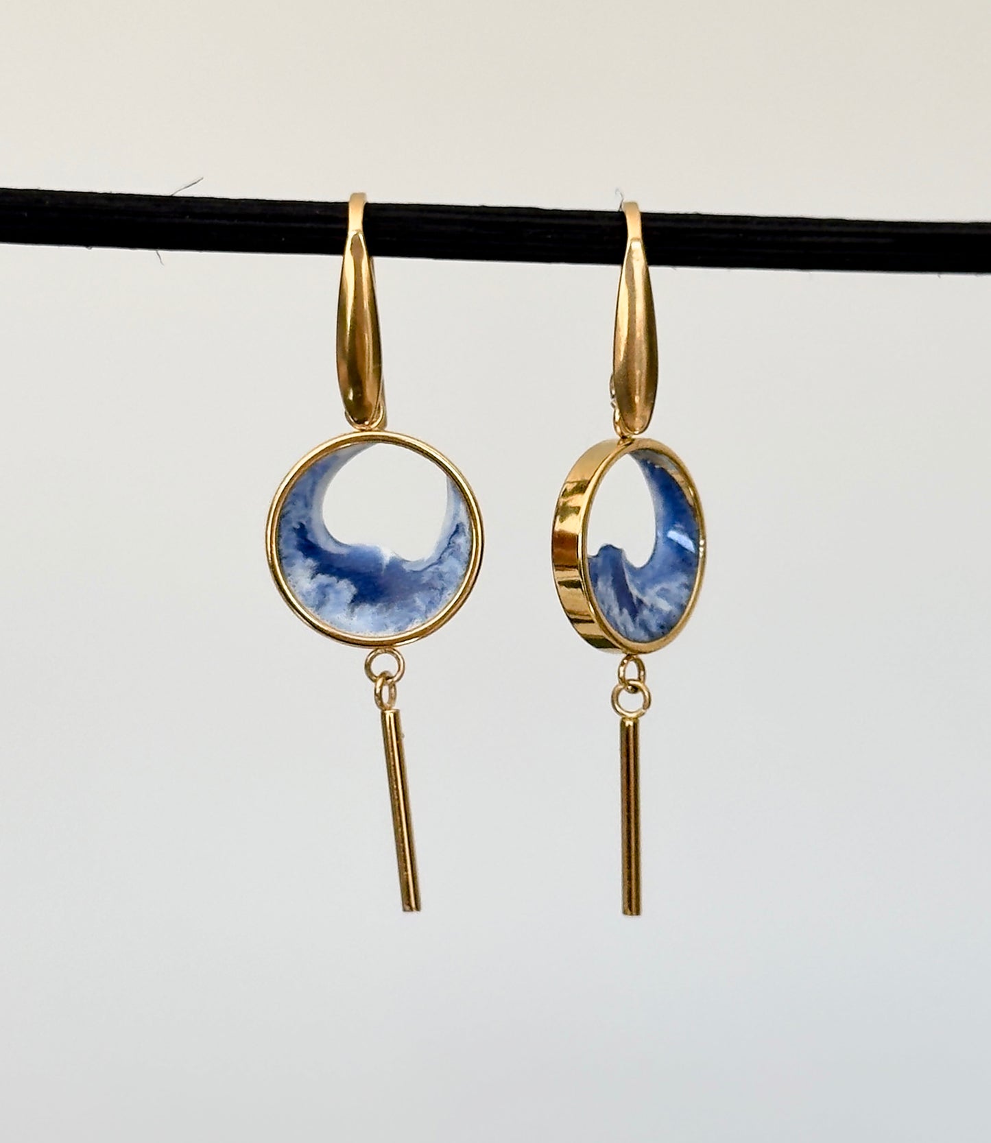 Stainless steel dangle earrings with waves