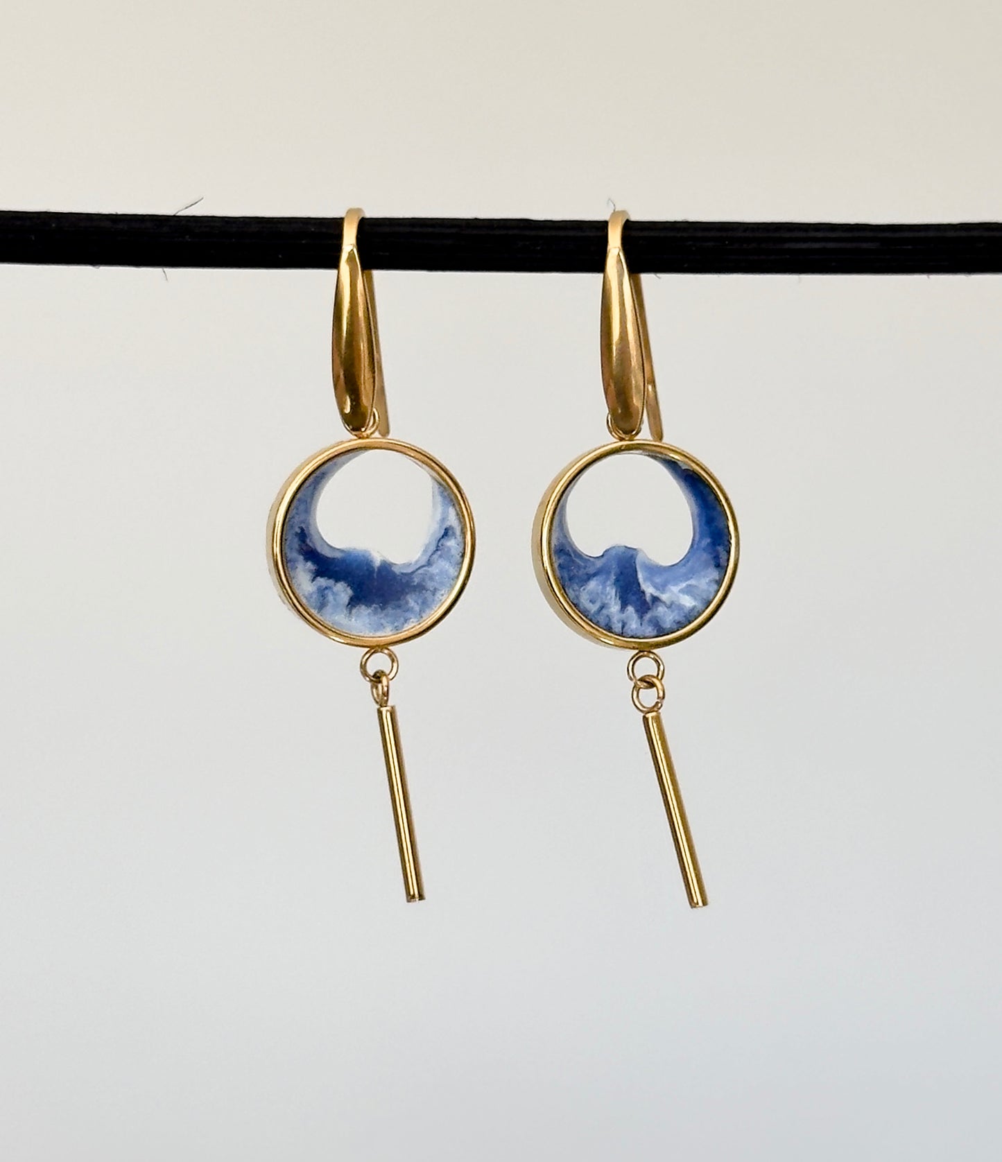 Stainless steel dangle earrings with waves