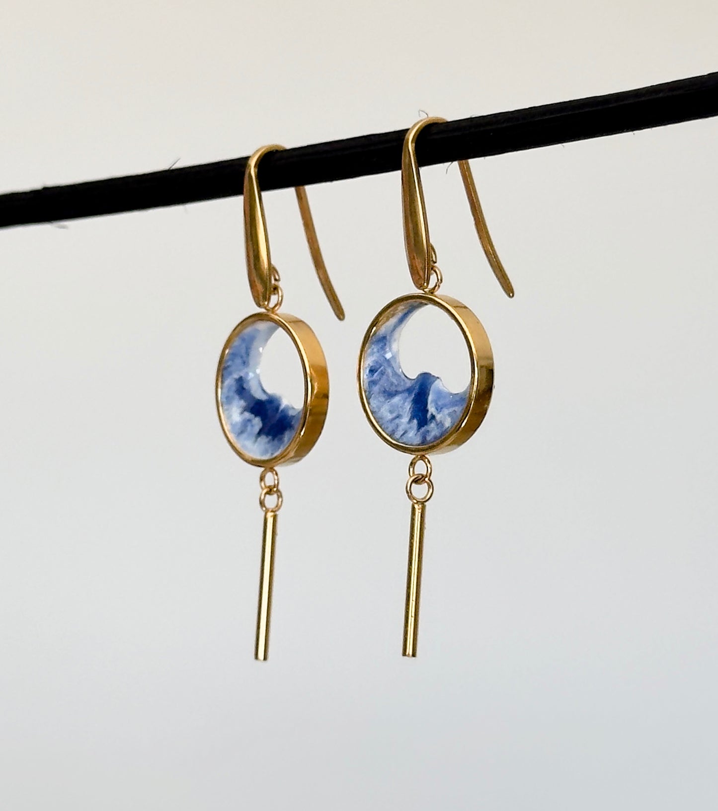 Stainless steel dangle earrings with waves