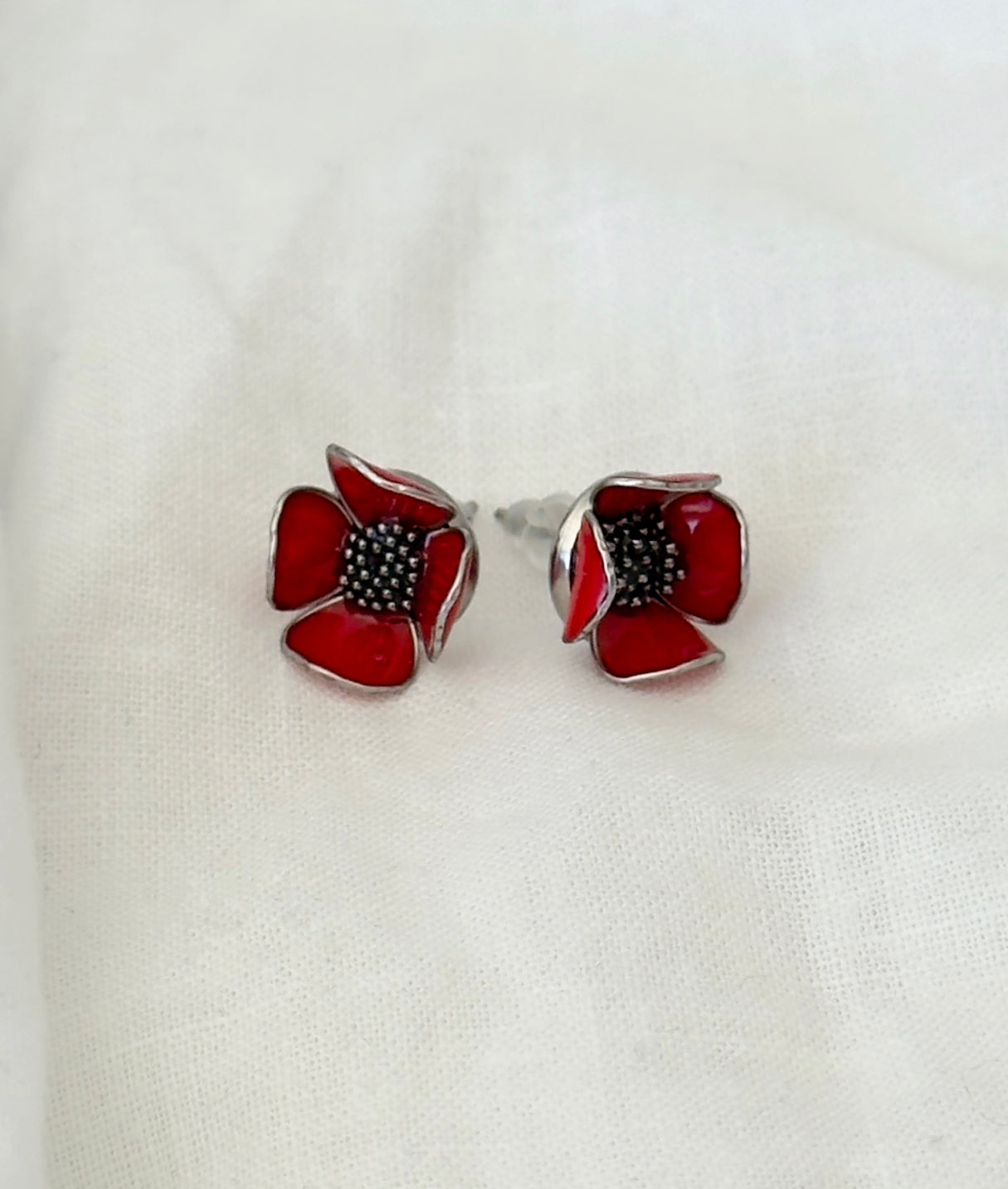 Pendientes de botón con forma de flores