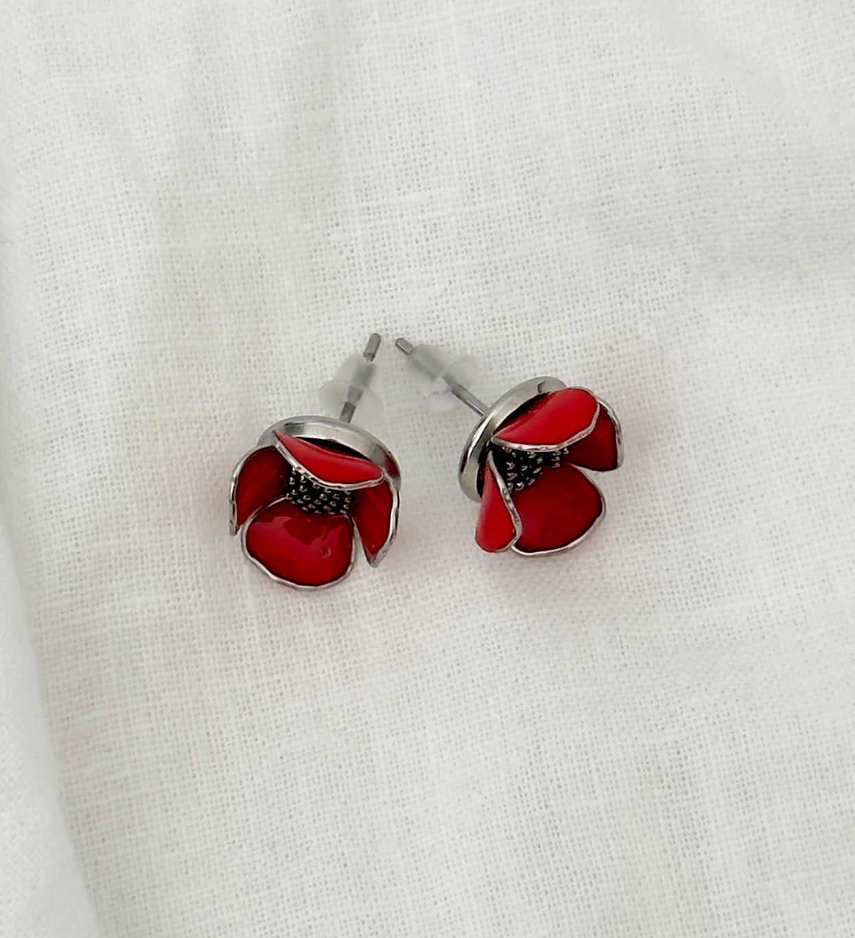 Pendientes de botón con forma de flores