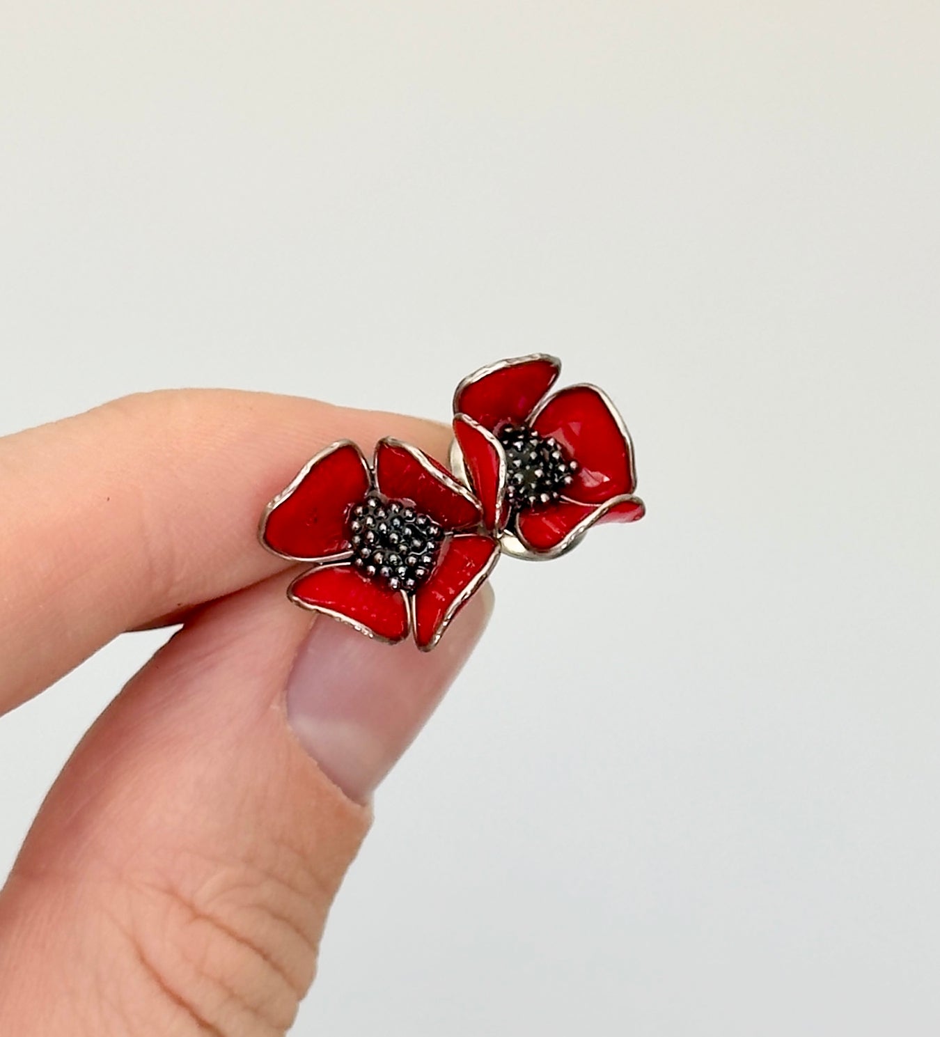 Pendientes de botón con forma de flores
