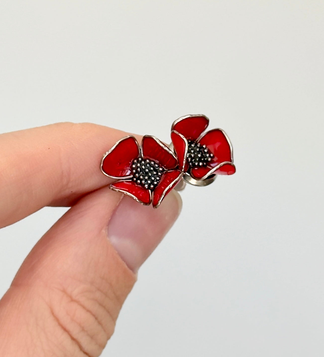 Pendientes de botón con forma de flores
