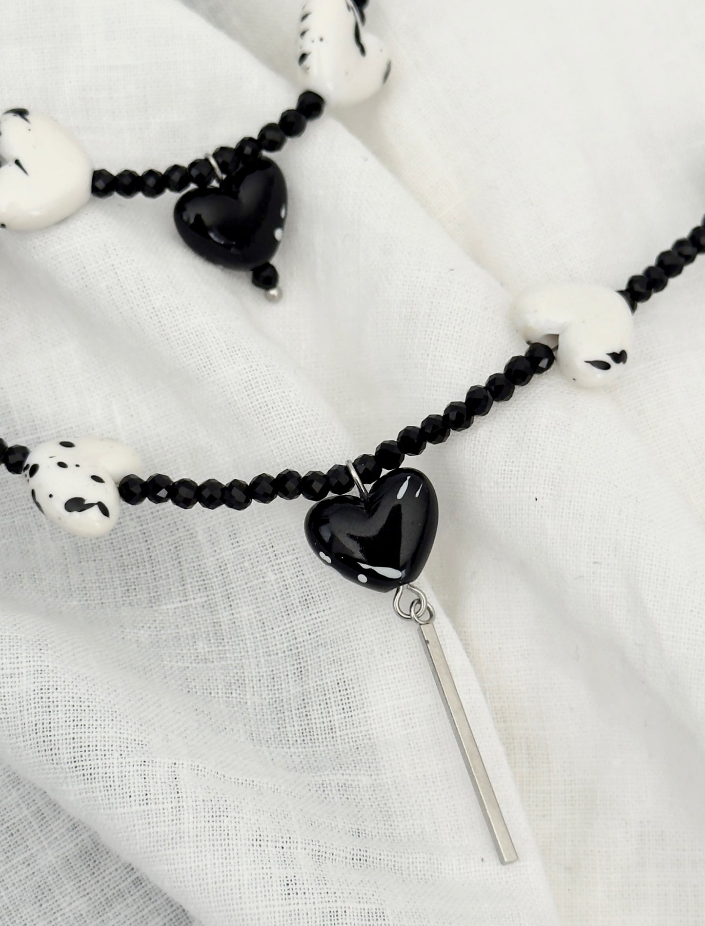 Conjunto de collar y pulsera con corazones