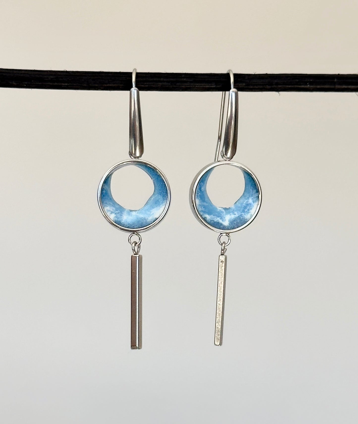 Stainless steel dangle earrings with waves