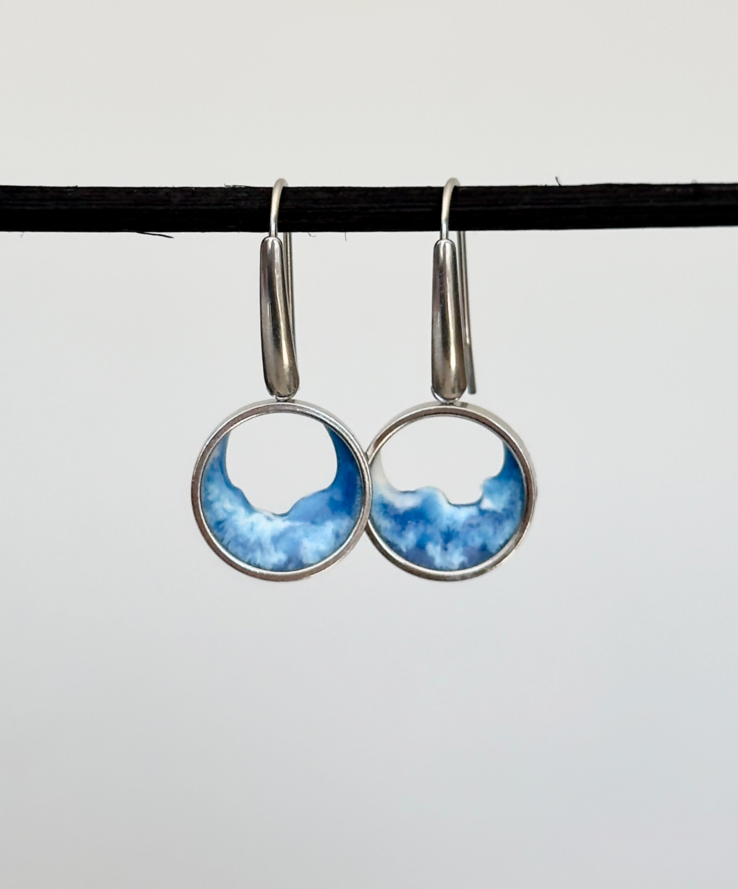 Stainless steel dangle earrings with waves