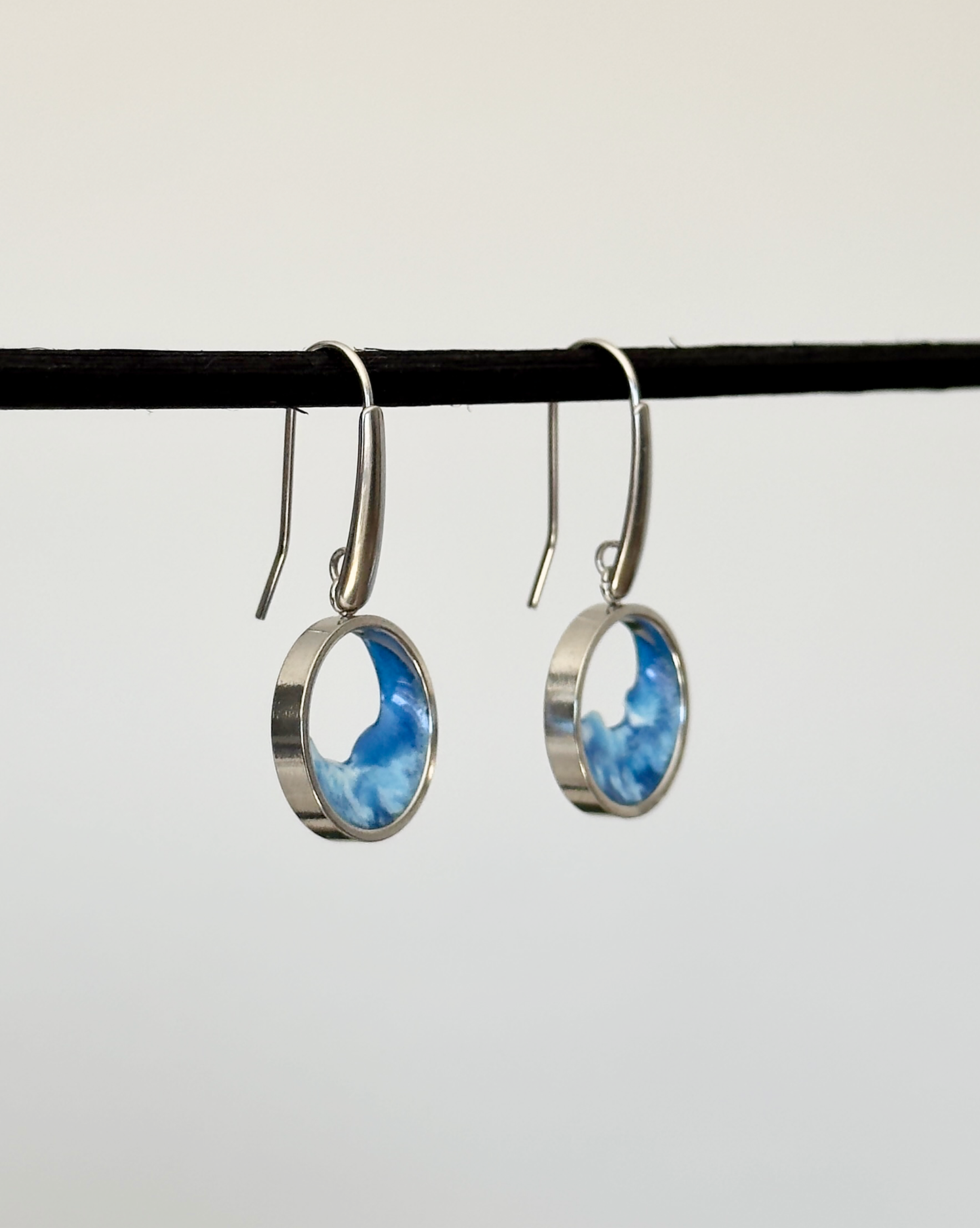Stainless steel dangle earrings with waves