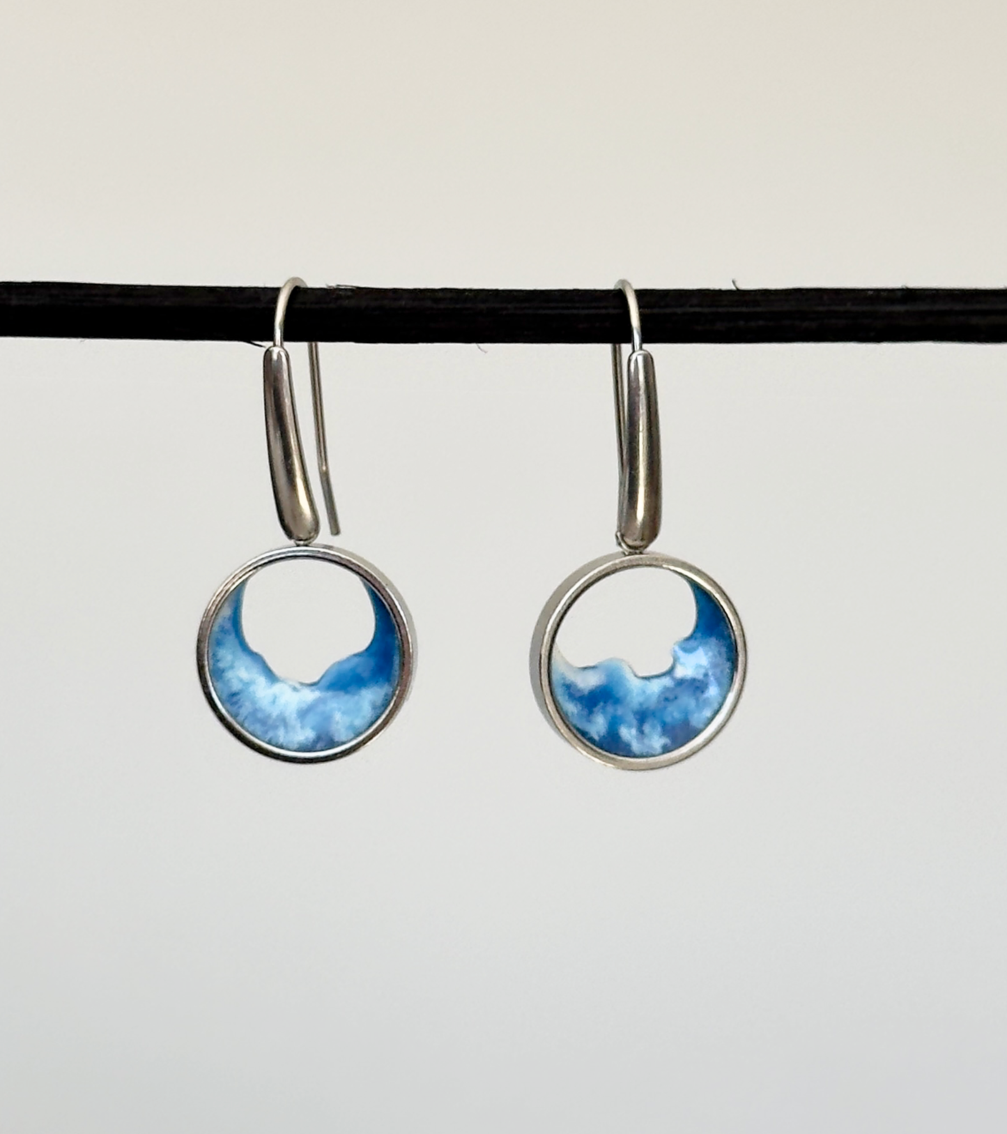 Stainless steel dangle earrings with waves