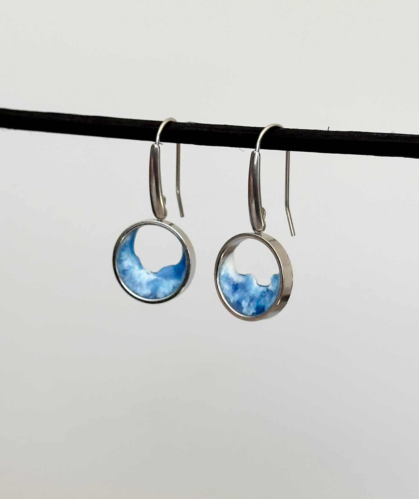 Stainless steel dangle earrings with waves