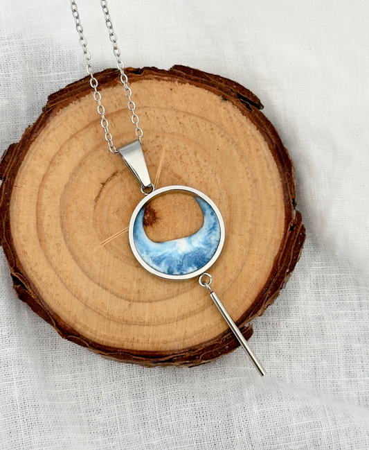 Colgante de acero inoxidable con olas