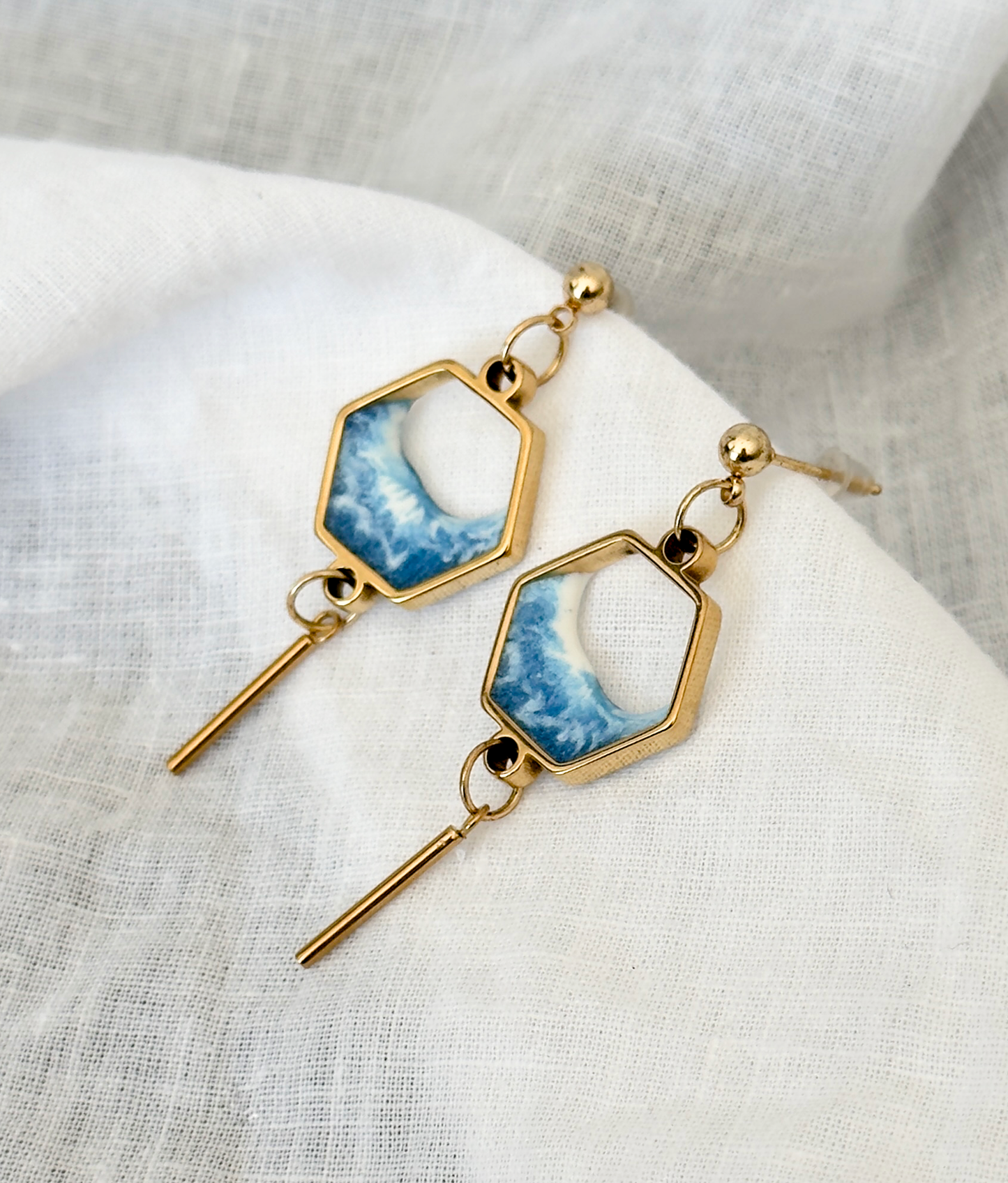 Stainless steel dangle earrings with waves