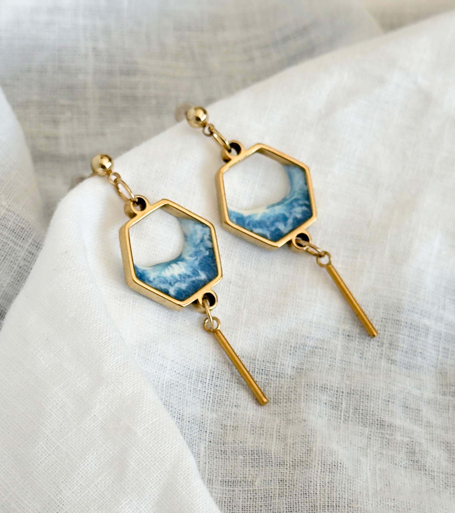 Stainless steel dangle earrings with waves
