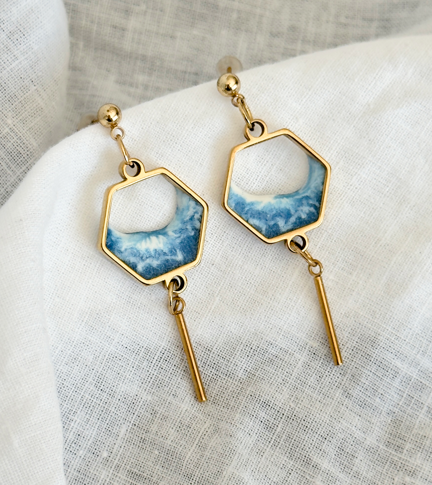 Stainless steel dangle earrings with waves