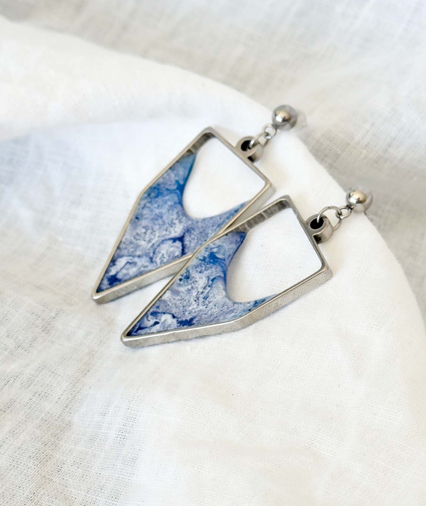 Stainless steel dangle earrings with waves