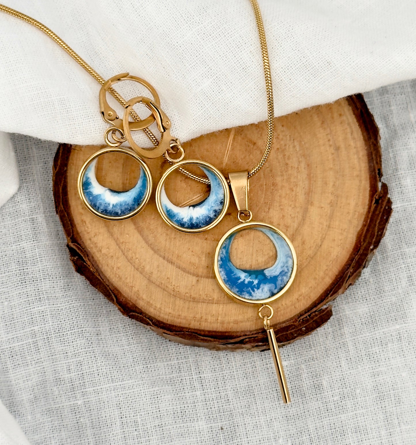 Pendientes y colgante de acero inoxidable con olas
