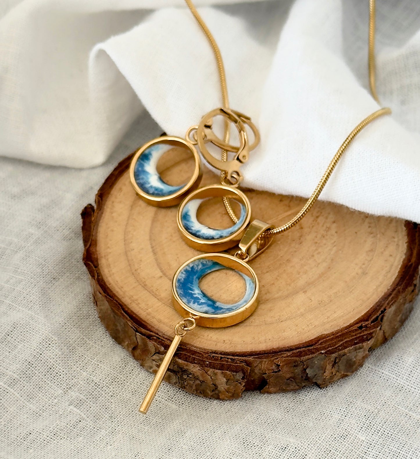Pendientes y colgante de acero inoxidable con olas