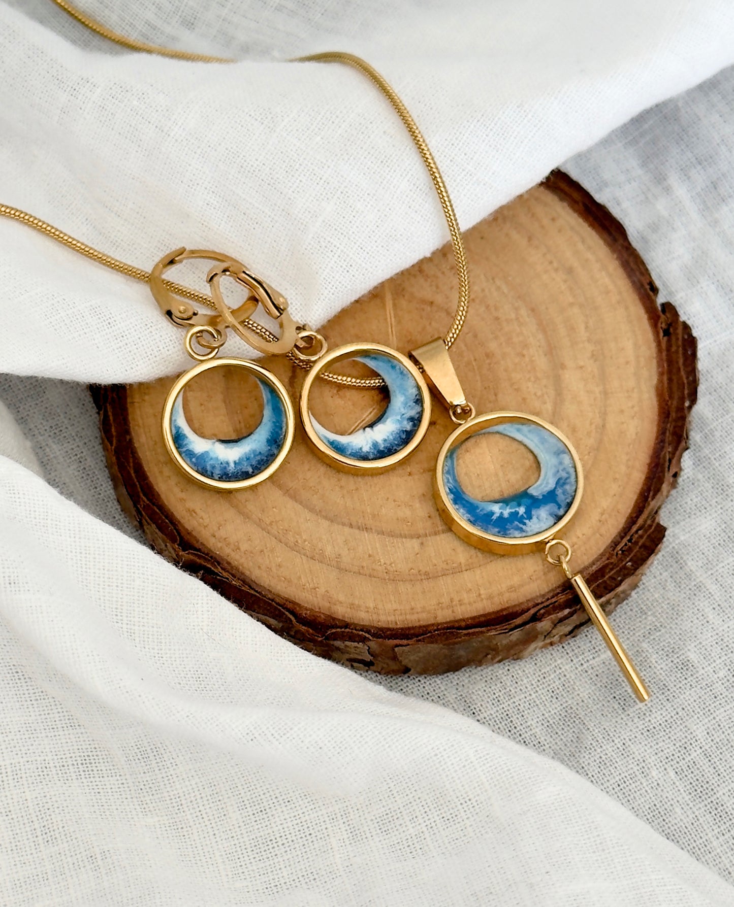 Pendientes y colgante de acero inoxidable con olas