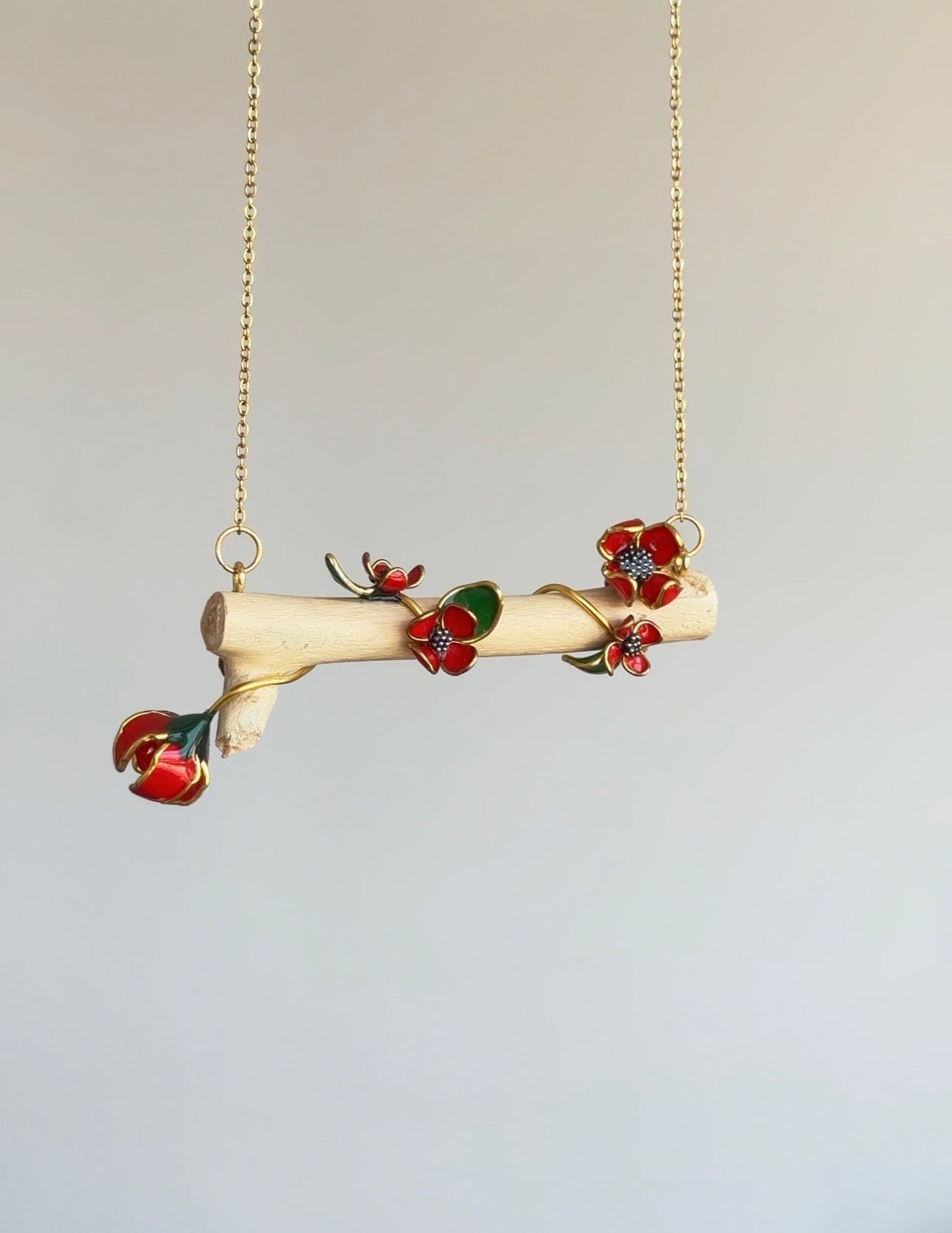 Colgante de ramita con flores
