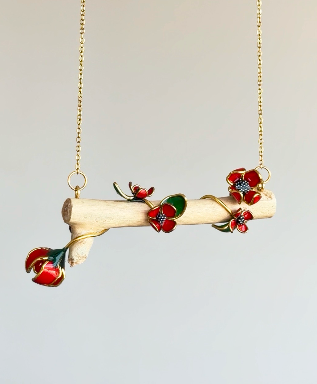 Colgante de ramita con flores