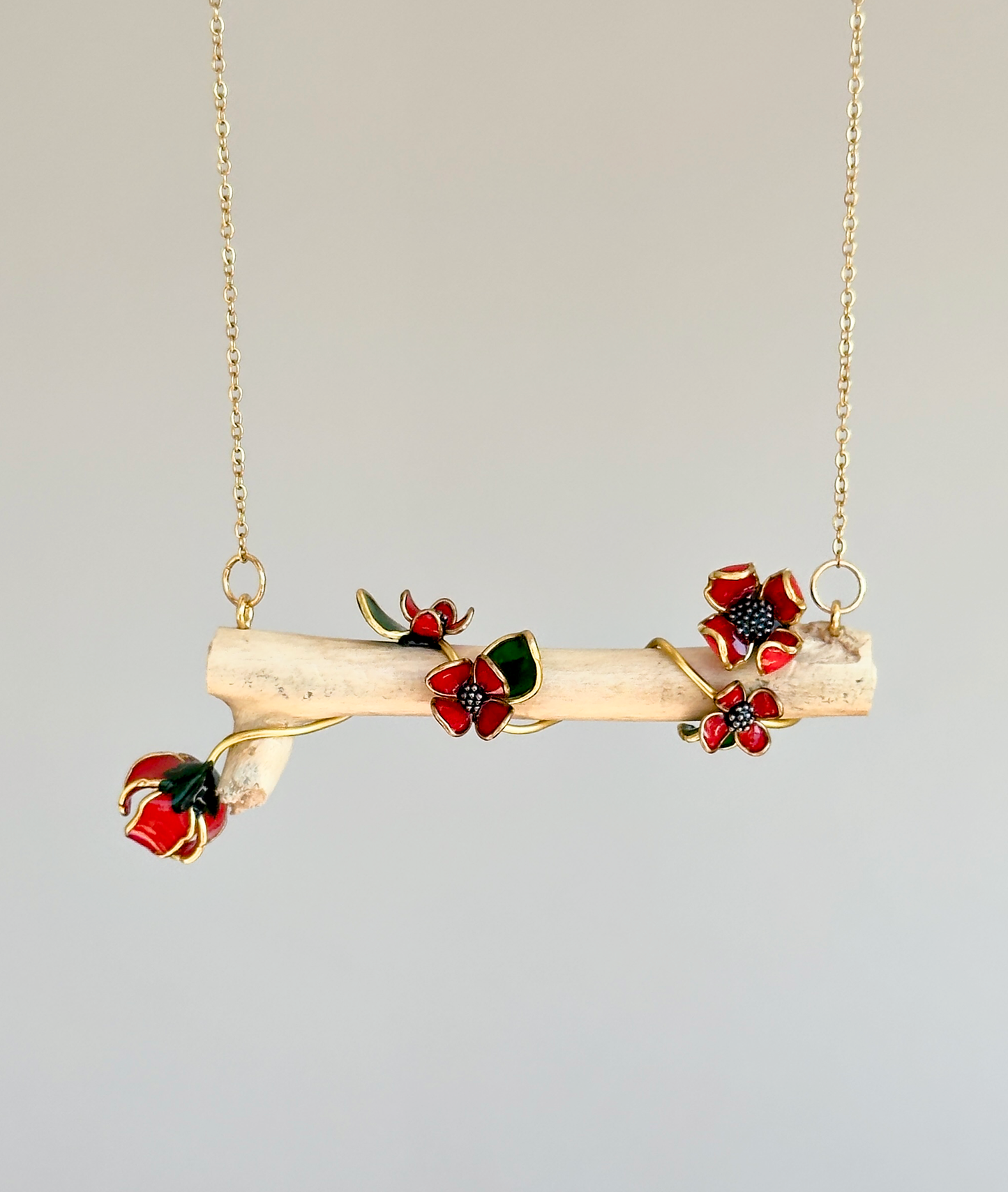 Colgante de ramita con flores