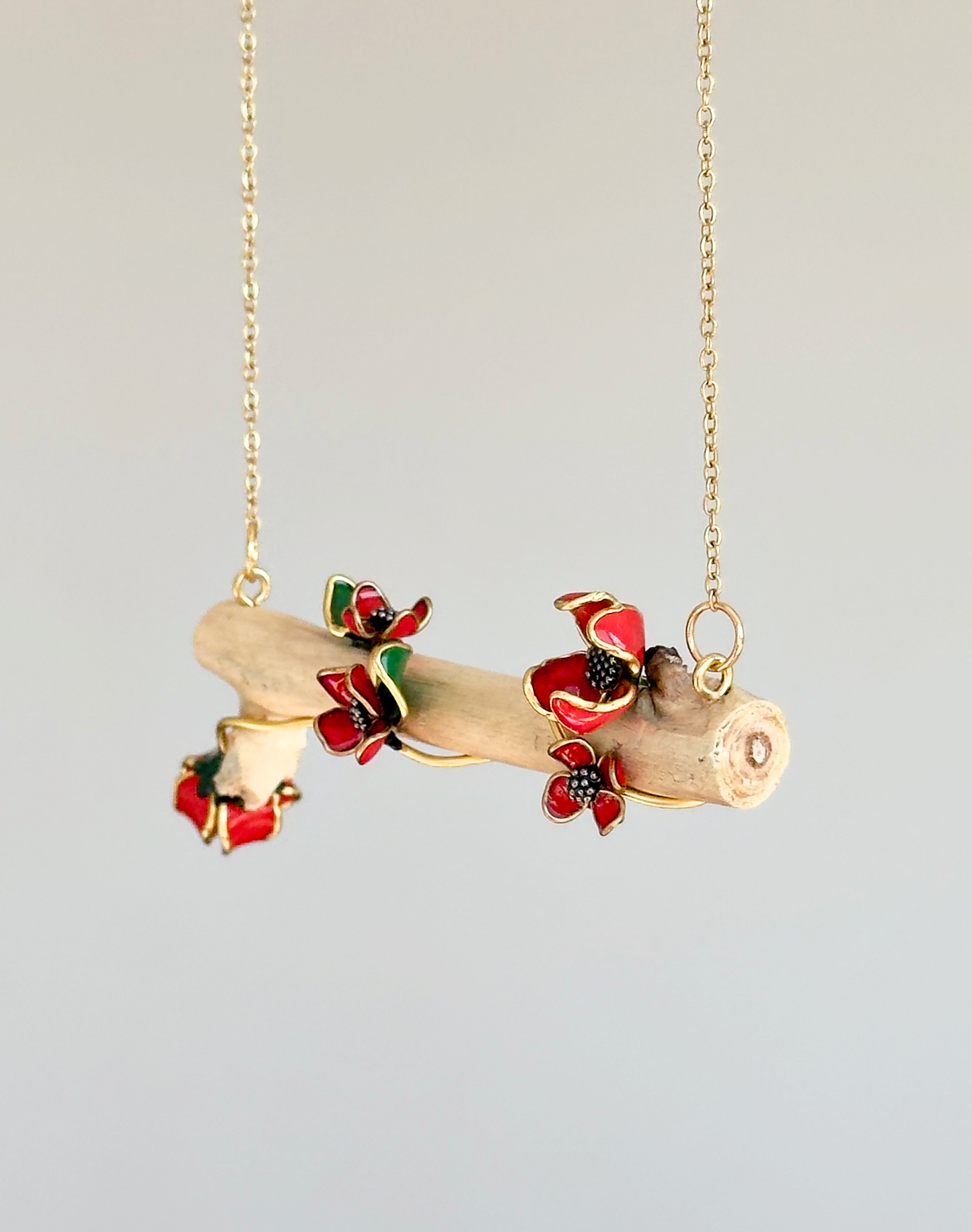 Colgante de ramita con flores