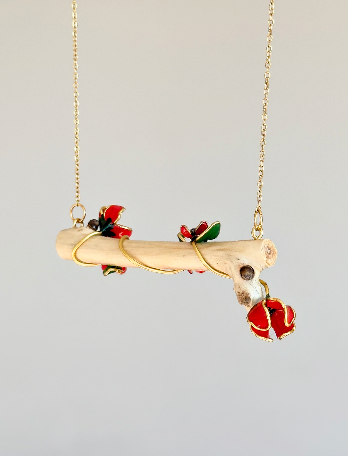 Colgante de ramita con flores