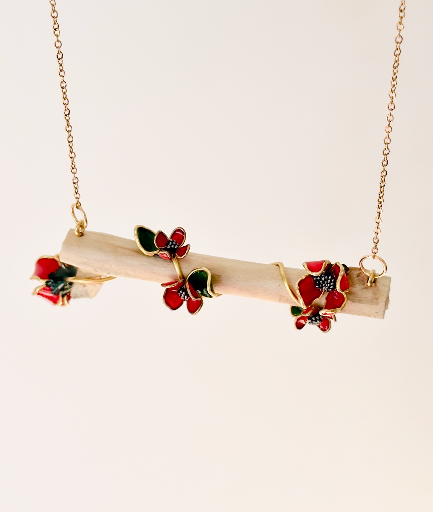 Colgante de ramita con flores